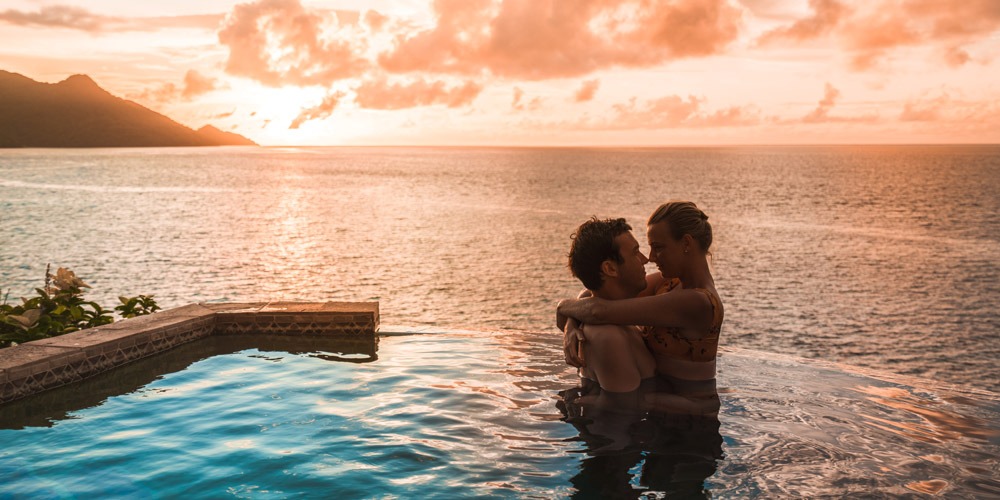 A couple hugging at a resort