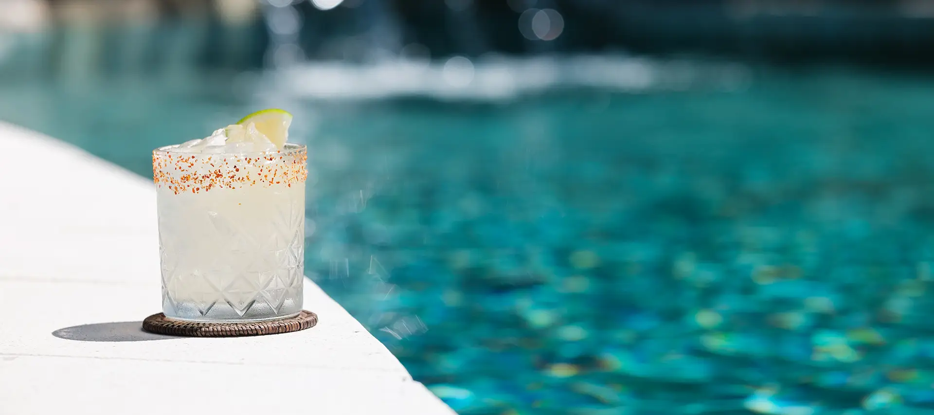 Chilled cocktail with a chili-salt rim and lime wedge served poolside at Royal Davui Island Resort, Fiji